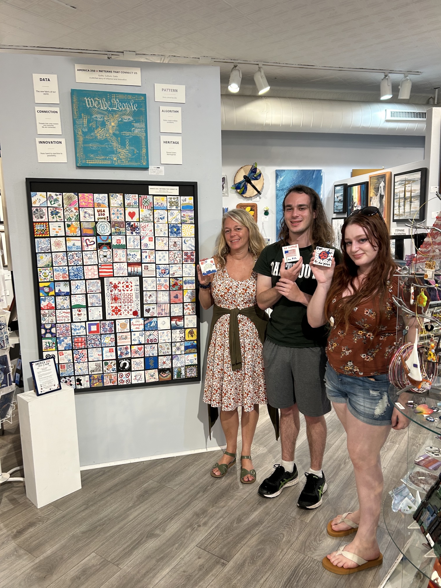 Visitors creating at the art table